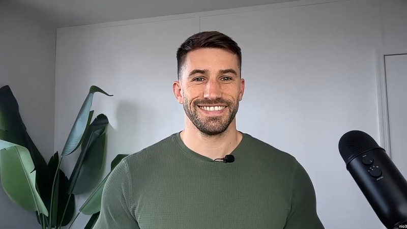 stable host Eoin Costello smiling to camera during a guided episode.
